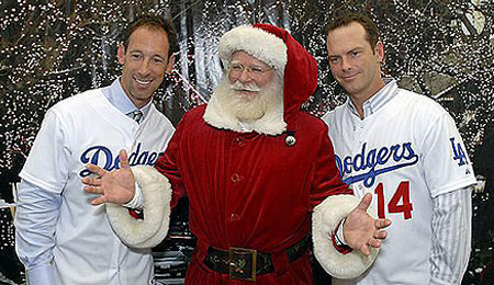 Los Angeles Dodgers outfielder Luis Gonzalez, left, has not been helping his owners this year.